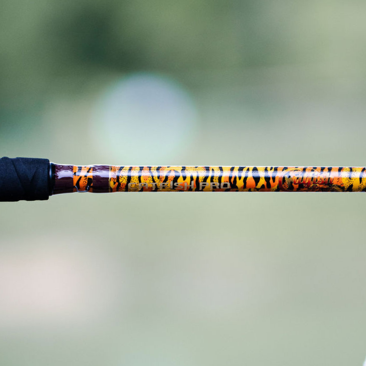 Catfish Pro 1 of 220 The Tiger Limited Edition Glow Casting Rod