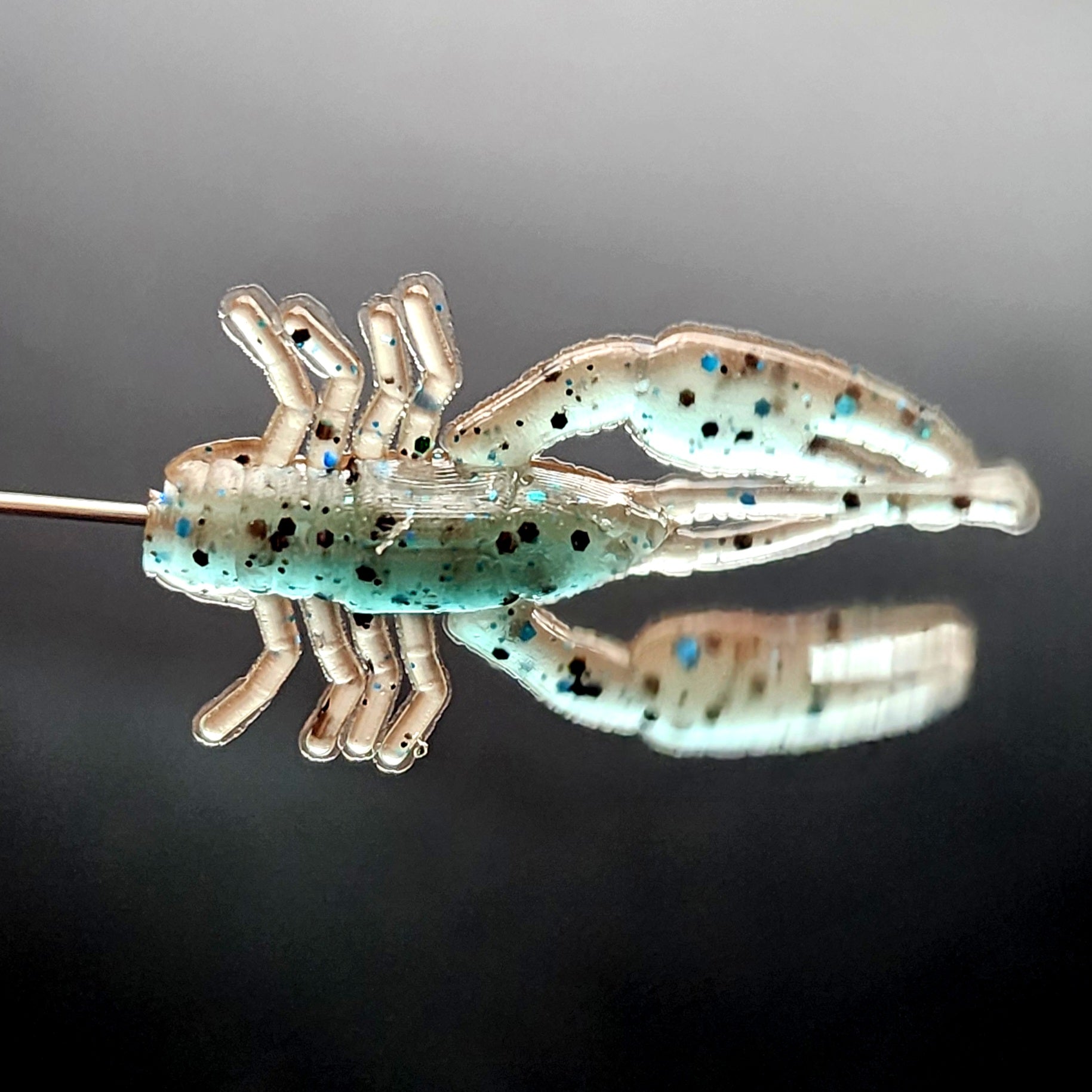Micro crayfish lure rigged on tungsten jig head