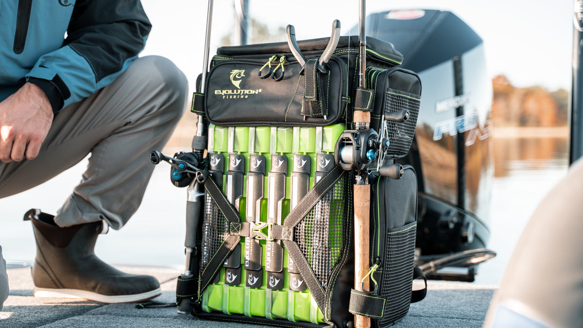 Fishing tackle backpack with rod holders and QuikLatch trays