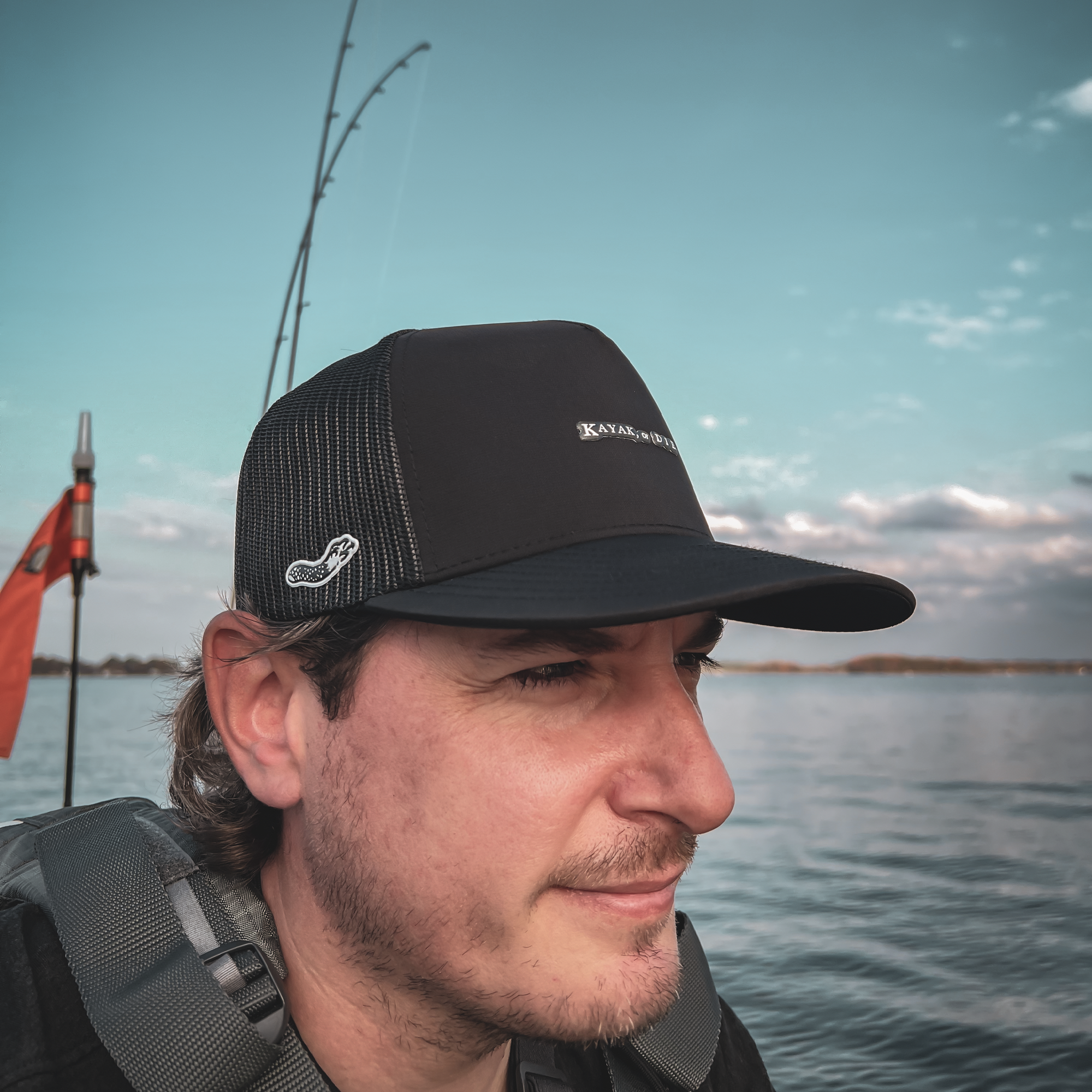 Versatile water-repellent snapback fitting secure for windy kayak trips