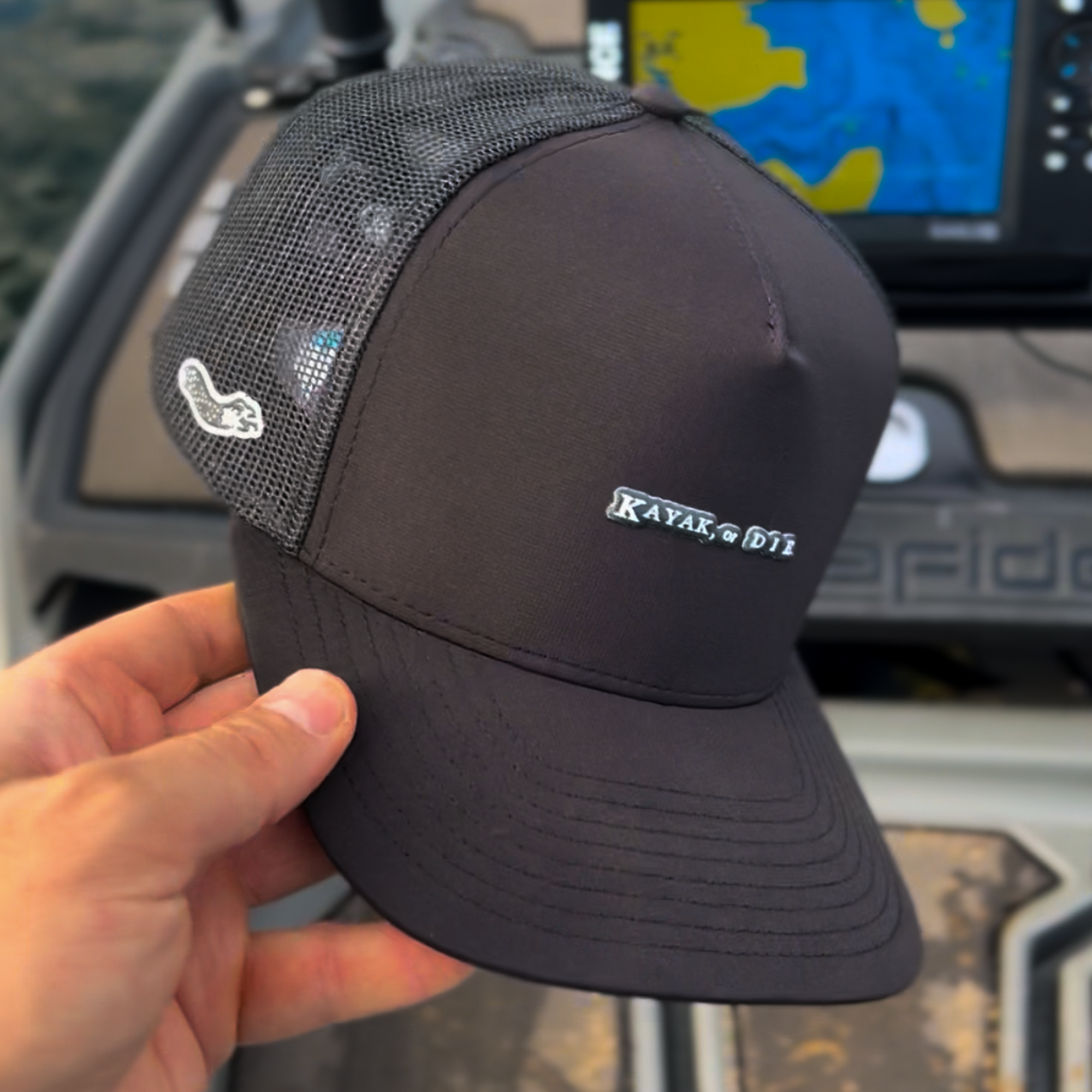 Versatile water-repellent snapback fitting secure for windy kayak trips
